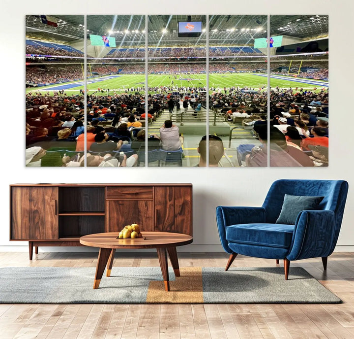 The living room features a large canvas print of the University of Texas at San Antonio Roadrunners football team, showcasing the San Antonio Alamodome. This museum-quality artwork enhances the space with its striking imagery.