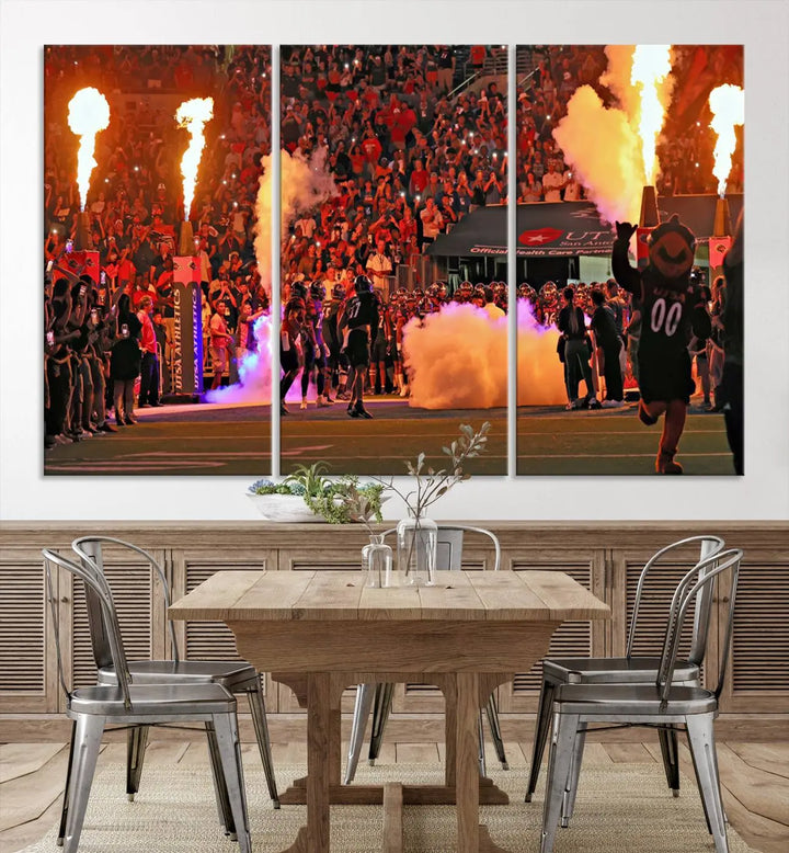 This museum-quality canvas, titled "The University of Texas at San Antonio Roadrunners Football Team Print - San Antonio Alamodome Wall Art Canvas Print," captures the intensity of a football game as players and a mascot charge through flames. The scene comes alive with high-resolution printing, crafted by professional artisans to bring a touch of excellence into your home.