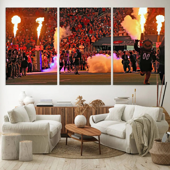 This museum-quality canvas, titled "The University of Texas at San Antonio Roadrunners Football Team Print - San Antonio Alamodome Wall Art Canvas Print," captures the intensity of a football game as players and a mascot charge through flames. The scene comes alive with high-resolution printing, crafted by professional artisans to bring a touch of excellence into your home.