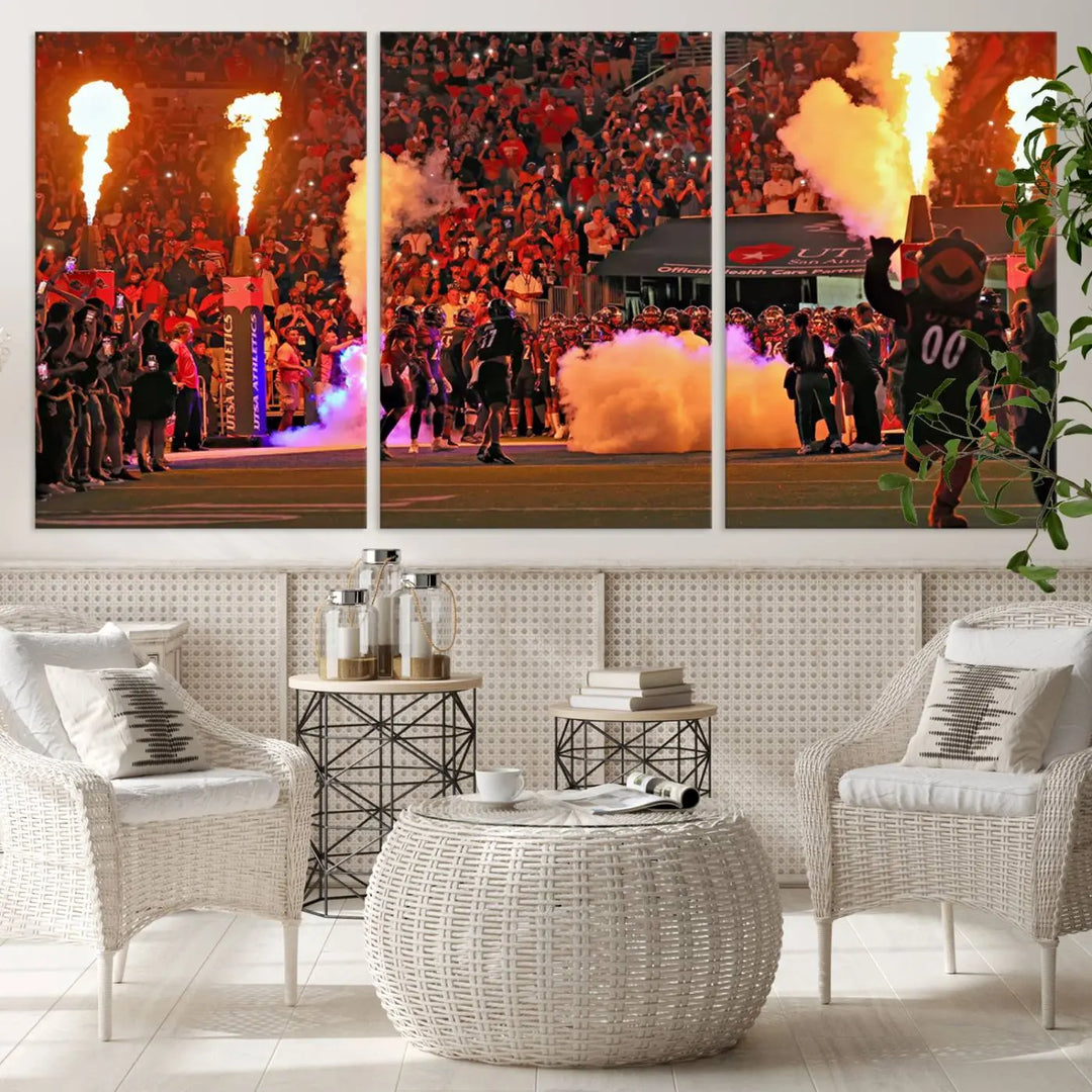 This museum-quality canvas, titled "The University of Texas at San Antonio Roadrunners Football Team Print - San Antonio Alamodome Wall Art Canvas Print," captures the intensity of a football game as players and a mascot charge through flames. The scene comes alive with high-resolution printing, crafted by professional artisans to bring a touch of excellence into your home.