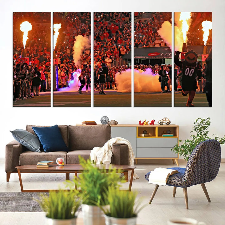 This museum-quality canvas, titled "The University of Texas at San Antonio Roadrunners Football Team Print - San Antonio Alamodome Wall Art Canvas Print," captures the intensity of a football game as players and a mascot charge through flames. The scene comes alive with high-resolution printing, crafted by professional artisans to bring a touch of excellence into your home.