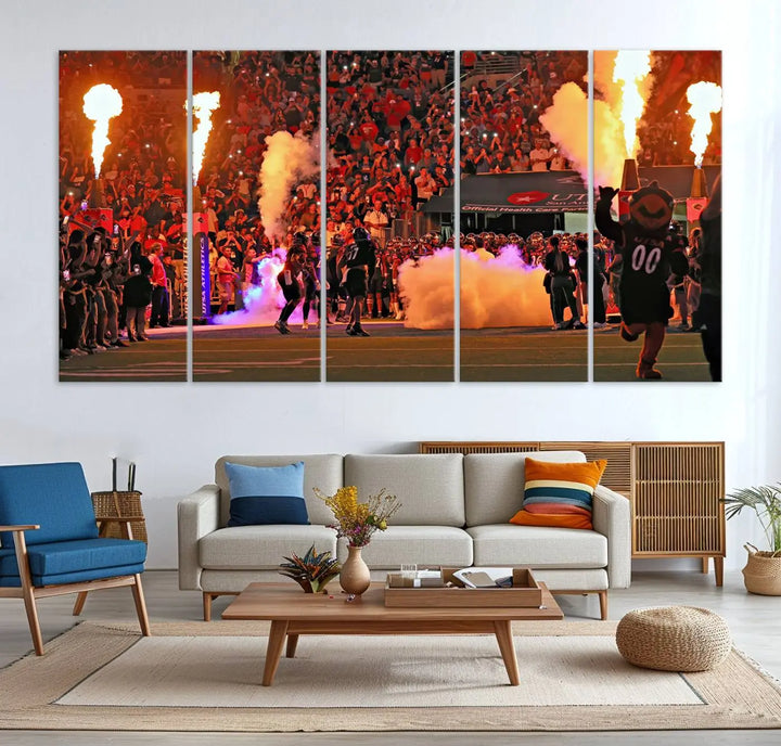 This museum-quality canvas, titled "The University of Texas at San Antonio Roadrunners Football Team Print - San Antonio Alamodome Wall Art Canvas Print," captures the intensity of a football game as players and a mascot charge through flames. The scene comes alive with high-resolution printing, crafted by professional artisans to bring a touch of excellence into your home.