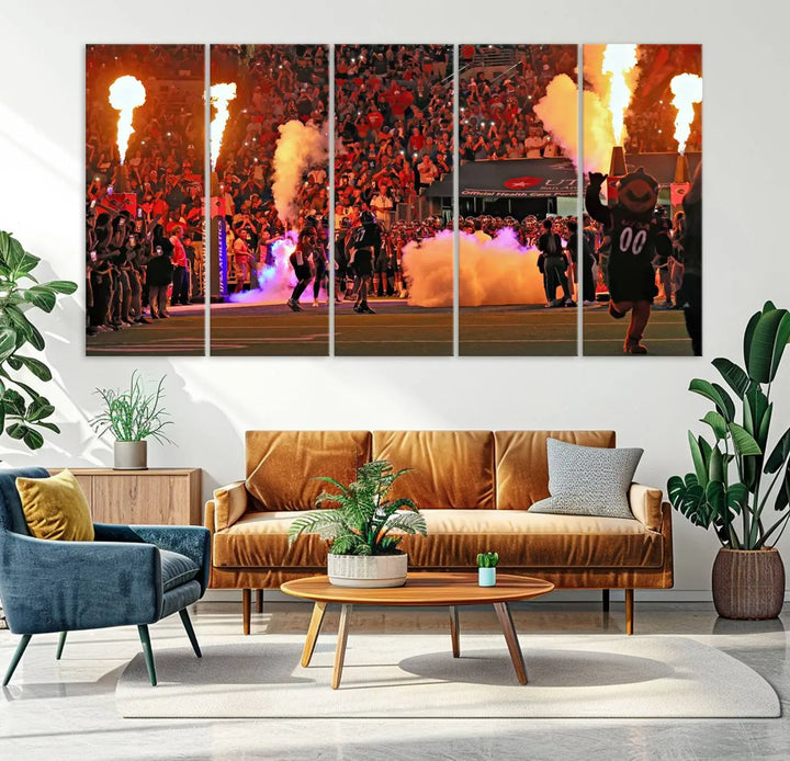 This museum-quality canvas, titled "The University of Texas at San Antonio Roadrunners Football Team Print - San Antonio Alamodome Wall Art Canvas Print," captures the intensity of a football game as players and a mascot charge through flames. The scene comes alive with high-resolution printing, crafted by professional artisans to bring a touch of excellence into your home.