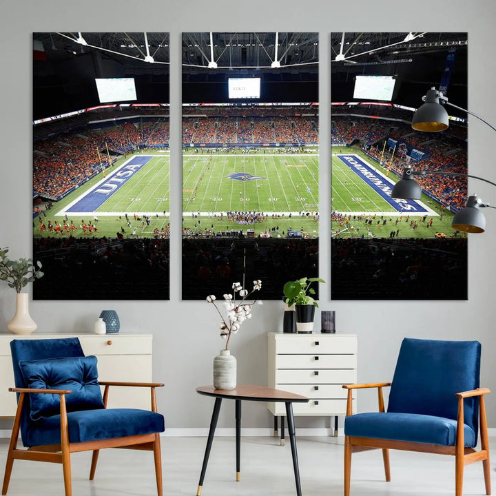 The living room features a large wall art of The University of Texas at San Antonio Roadrunners Football Team, capturing the vibrant atmosphere of the San Antonio Alamodome and printed with museum-quality precision.