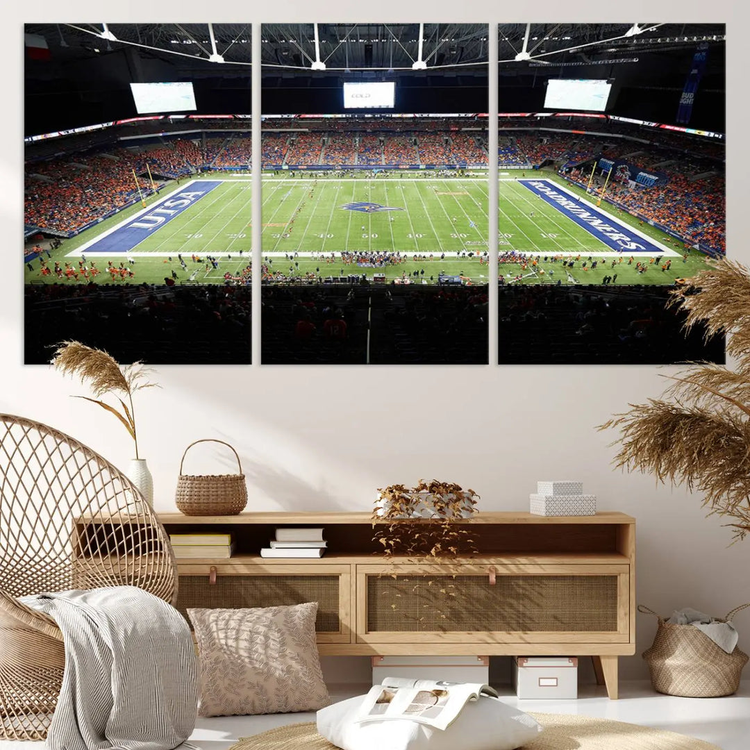 The living room features a large wall art of The University of Texas at San Antonio Roadrunners Football Team, capturing the vibrant atmosphere of the San Antonio Alamodome and printed with museum-quality precision.