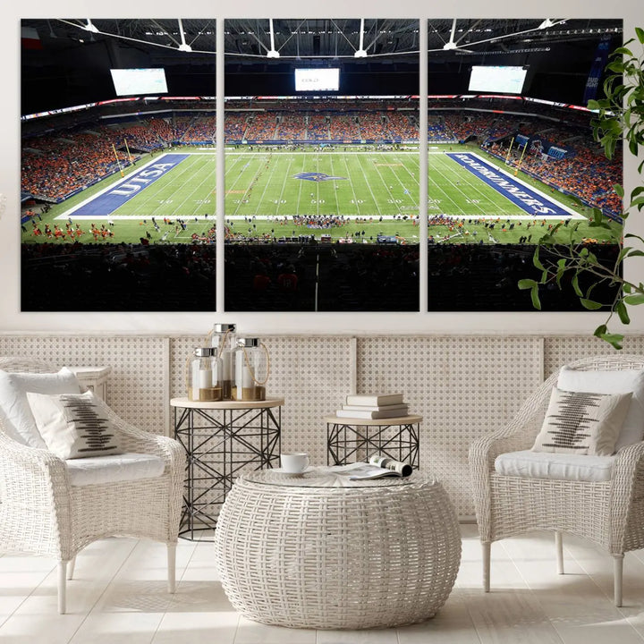 The living room features a large wall art of The University of Texas at San Antonio Roadrunners Football Team, capturing the vibrant atmosphere of the San Antonio Alamodome and printed with museum-quality precision.