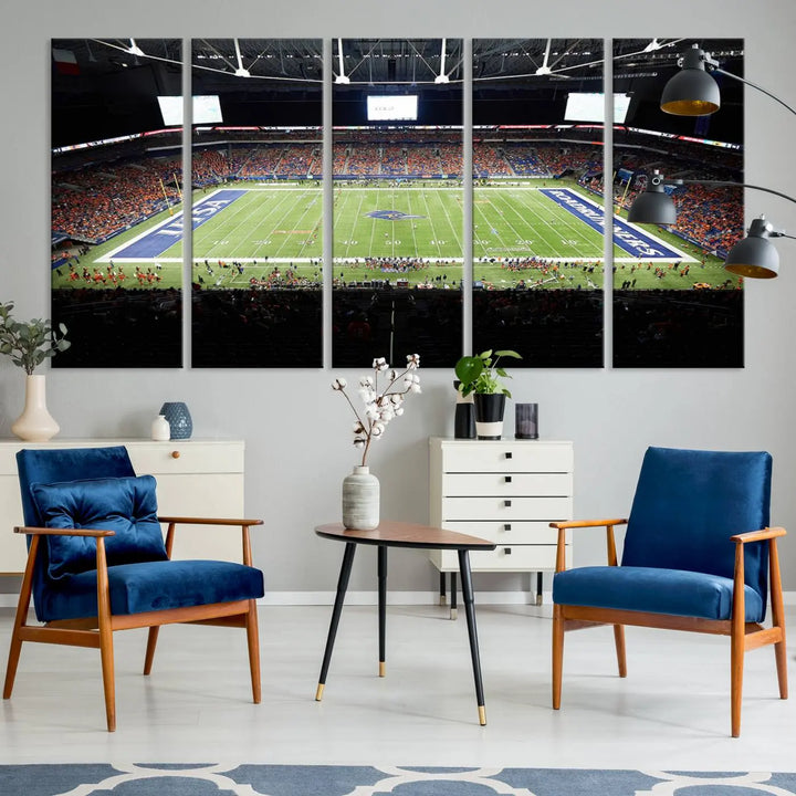 The living room features a large wall art of The University of Texas at San Antonio Roadrunners Football Team, capturing the vibrant atmosphere of the San Antonio Alamodome and printed with museum-quality precision.