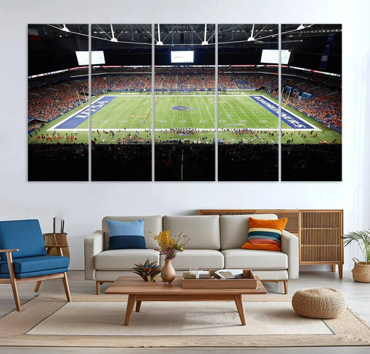 The living room features a large wall art of The University of Texas at San Antonio Roadrunners Football Team, capturing the vibrant atmosphere of the San Antonio Alamodome and printed with museum-quality precision.