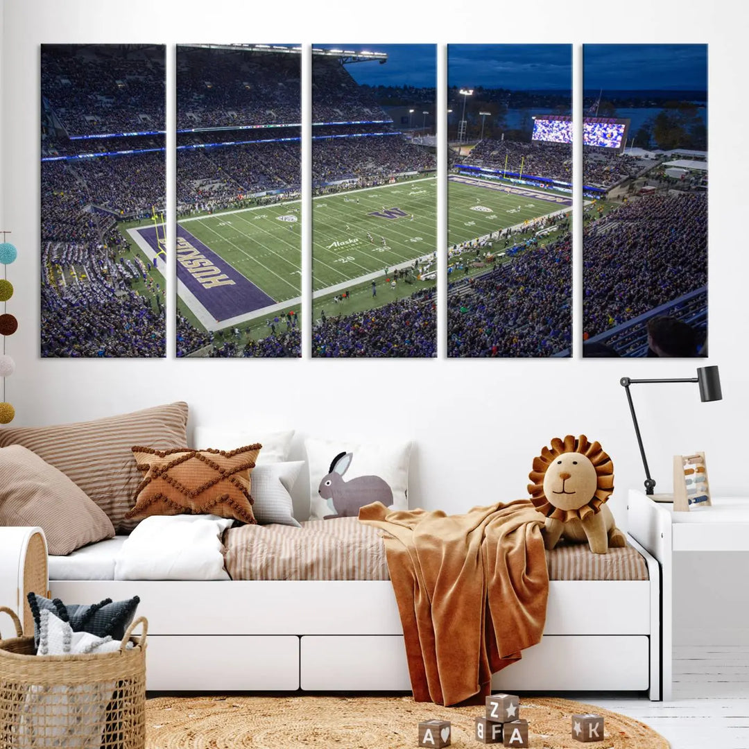 The living room features The University of Washington Huskies Football Team Print, showcasing a vibrant triptych of Seattle's Husky Stadium above the couch. This dynamic artwork is elegantly balanced by subtle animal portrait art, creating an inviting ambiance.