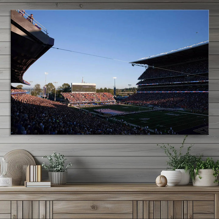 The living room features a triptych wall art showcasing "The University of Washington Huskies Football Team Print - Seattle Husky Stadium Wall Art Canvas Print," capturing a husky and stadium scene during an exhilarating sports event.