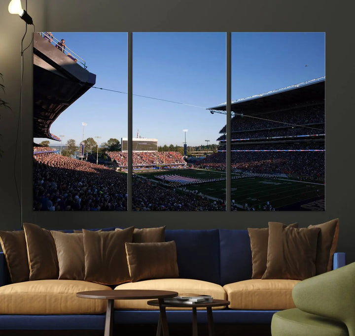 The living room features a triptych wall art showcasing "The University of Washington Huskies Football Team Print - Seattle Husky Stadium Wall Art Canvas Print," capturing a husky and stadium scene during an exhilarating sports event.