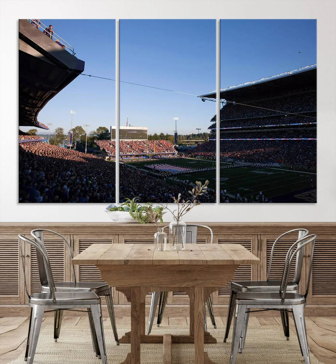 The living room features a triptych wall art showcasing "The University of Washington Huskies Football Team Print - Seattle Husky Stadium Wall Art Canvas Print," capturing a husky and stadium scene during an exhilarating sports event.