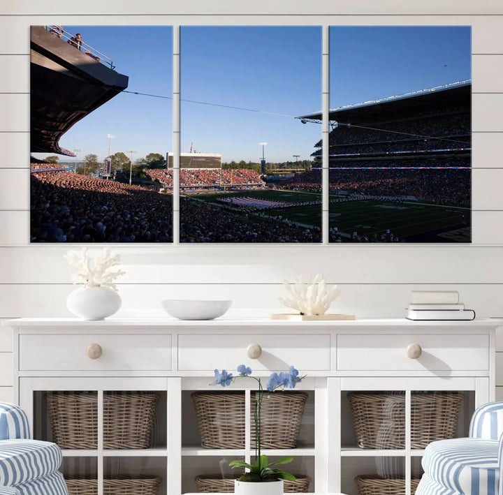 The living room features a triptych wall art showcasing "The University of Washington Huskies Football Team Print - Seattle Husky Stadium Wall Art Canvas Print," capturing a husky and stadium scene during an exhilarating sports event.