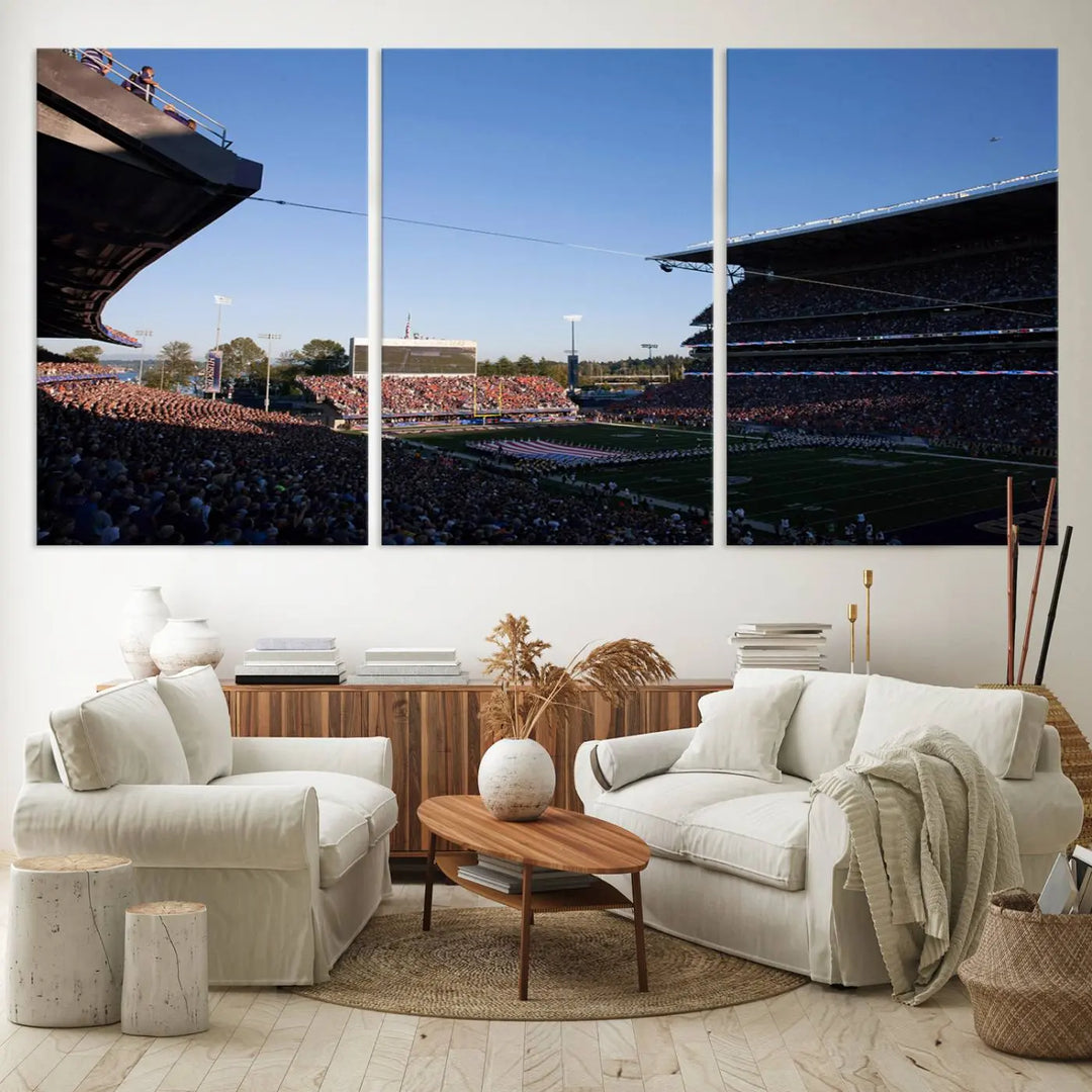 The living room features a triptych wall art showcasing "The University of Washington Huskies Football Team Print - Seattle Husky Stadium Wall Art Canvas Print," capturing a husky and stadium scene during an exhilarating sports event.