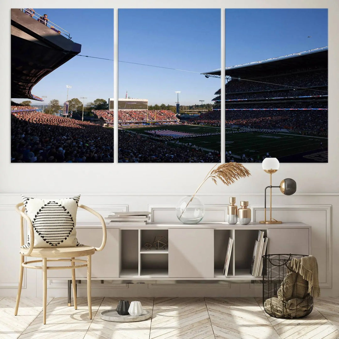 The living room features a triptych wall art showcasing "The University of Washington Huskies Football Team Print - Seattle Husky Stadium Wall Art Canvas Print," capturing a husky and stadium scene during an exhilarating sports event.