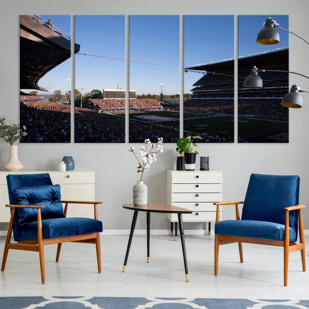 The living room features a triptych wall art showcasing "The University of Washington Huskies Football Team Print - Seattle Husky Stadium Wall Art Canvas Print," capturing a husky and stadium scene during an exhilarating sports event.