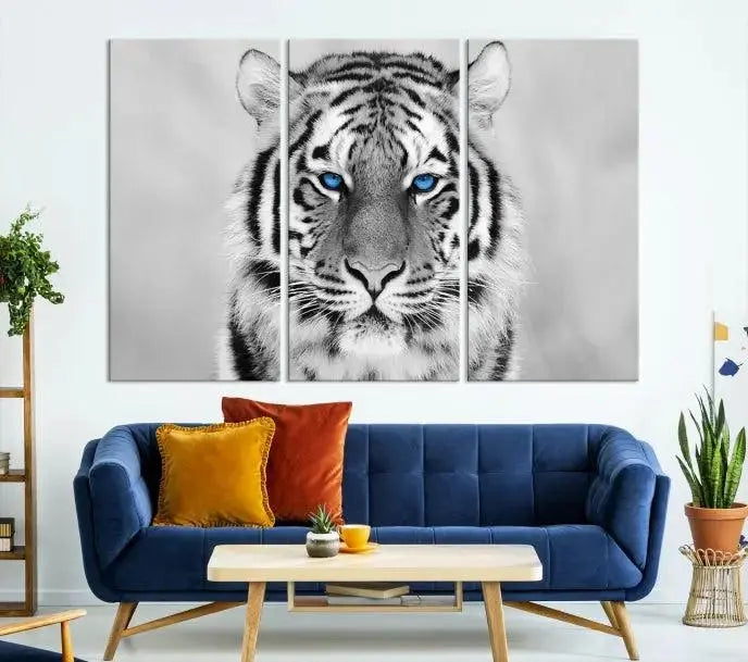 A striking triptych titled "Tiger Canvas Artwork Wall Art Print" showcases a white tiger with captivating blue eyes. This museum-quality, gallery-wrapped canvas stands out elegantly on its own, crafting a sophisticated visual experience.