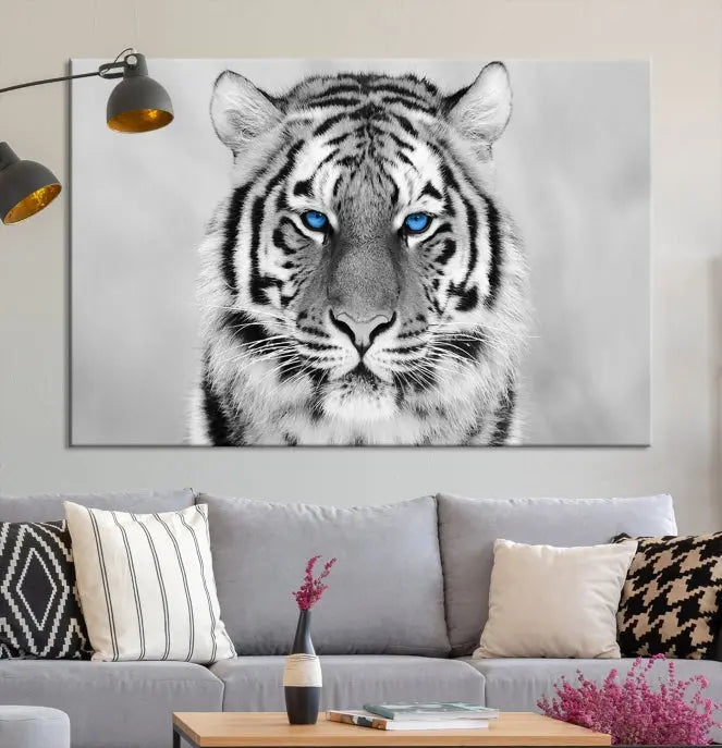 A striking triptych titled "Tiger Canvas Artwork Wall Art Print" showcases a white tiger with captivating blue eyes. This museum-quality, gallery-wrapped canvas stands out elegantly on its own, crafting a sophisticated visual experience.