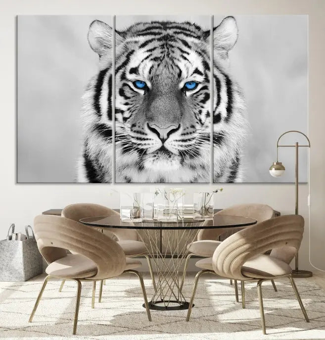 A striking triptych titled "Tiger Canvas Artwork Wall Art Print" showcases a white tiger with captivating blue eyes. This museum-quality, gallery-wrapped canvas stands out elegantly on its own, crafting a sophisticated visual experience.