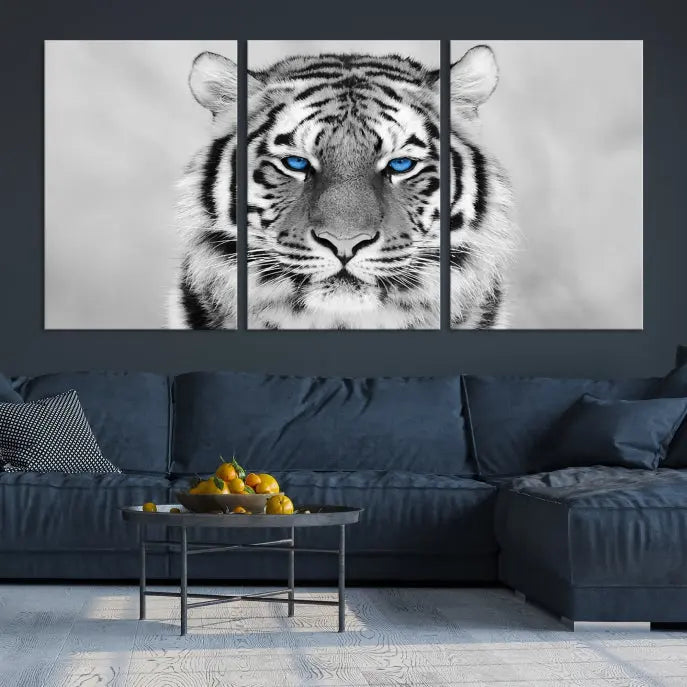 A striking triptych titled "Tiger Canvas Artwork Wall Art Print" showcases a white tiger with captivating blue eyes. This museum-quality, gallery-wrapped canvas stands out elegantly on its own, crafting a sophisticated visual experience.