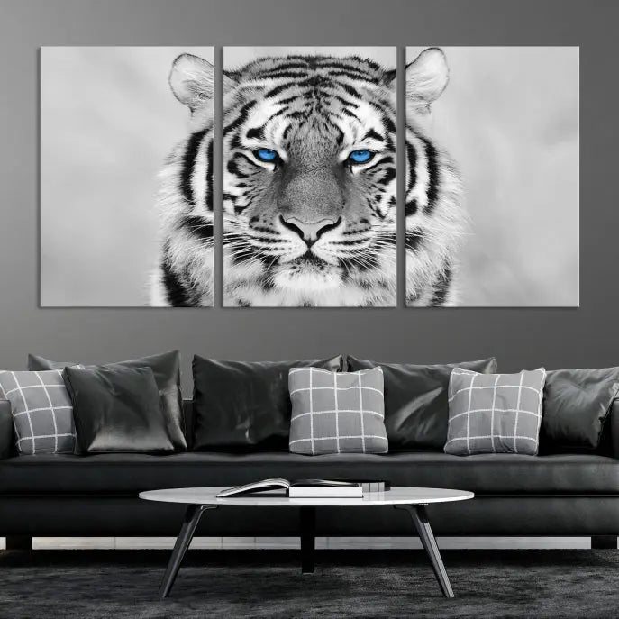 A striking triptych titled "Tiger Canvas Artwork Wall Art Print" showcases a white tiger with captivating blue eyes. This museum-quality, gallery-wrapped canvas stands out elegantly on its own, crafting a sophisticated visual experience.