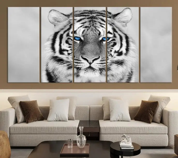 A striking triptych titled "Tiger Canvas Artwork Wall Art Print" showcases a white tiger with captivating blue eyes. This museum-quality, gallery-wrapped canvas stands out elegantly on its own, crafting a sophisticated visual experience.