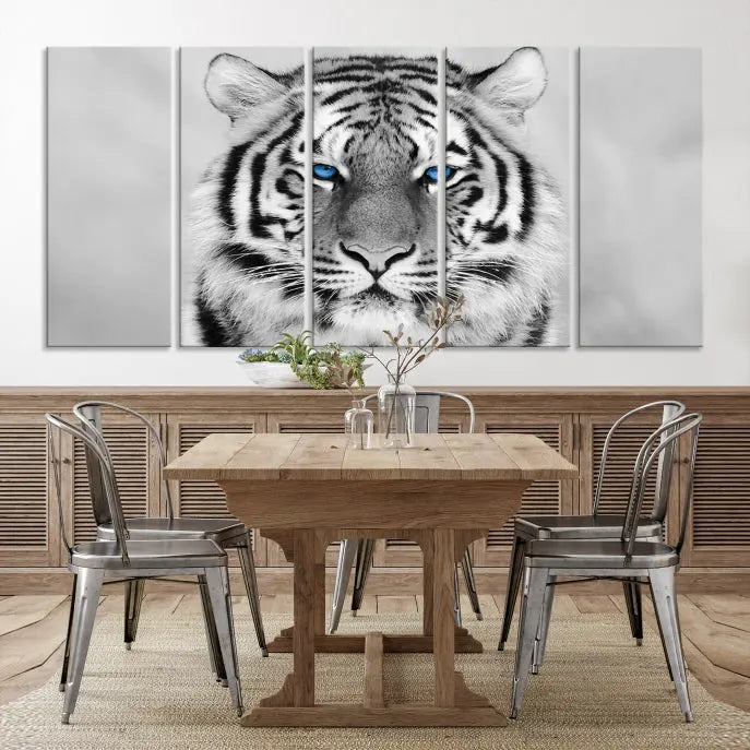 A striking triptych titled "Tiger Canvas Artwork Wall Art Print" showcases a white tiger with captivating blue eyes. This museum-quality, gallery-wrapped canvas stands out elegantly on its own, crafting a sophisticated visual experience.