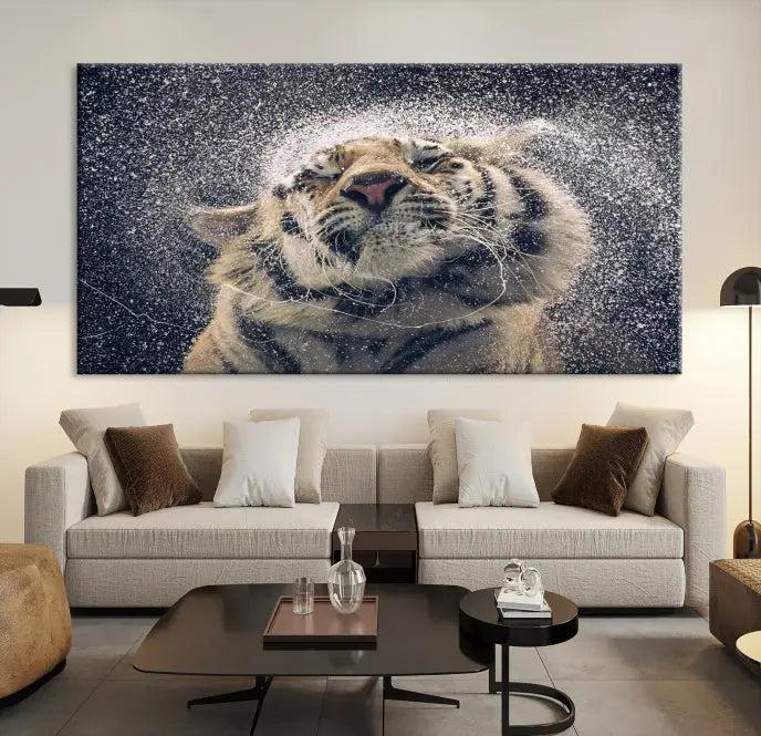 The "Tiger and Rain Canvas Print," featuring a triptych design of a tiger shaking off water, is printed on museum-quality canvas with gallery-wrapped edges.