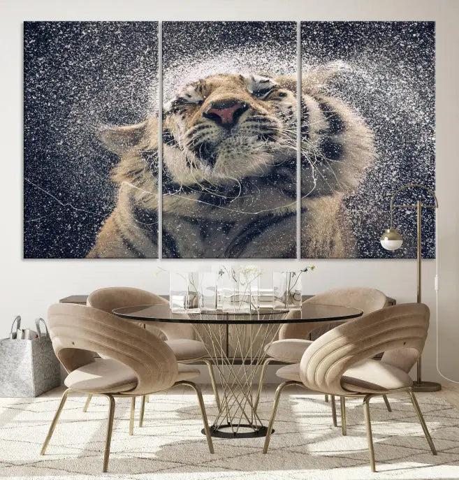 The "Tiger and Rain Canvas Print," featuring a triptych design of a tiger shaking off water, is printed on museum-quality canvas with gallery-wrapped edges.