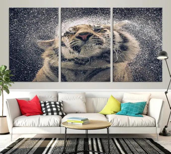 The "Tiger and Rain Canvas Print," featuring a triptych design of a tiger shaking off water, is printed on museum-quality canvas with gallery-wrapped edges.