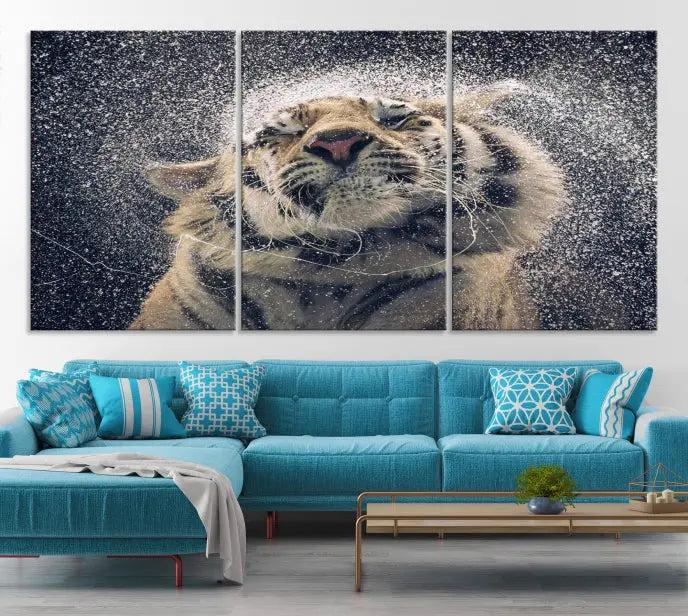 The "Tiger and Rain Canvas Print," featuring a triptych design of a tiger shaking off water, is printed on museum-quality canvas with gallery-wrapped edges.