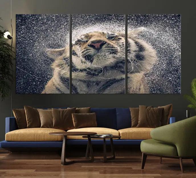 The "Tiger and Rain Canvas Print," featuring a triptych design of a tiger shaking off water, is printed on museum-quality canvas with gallery-wrapped edges.