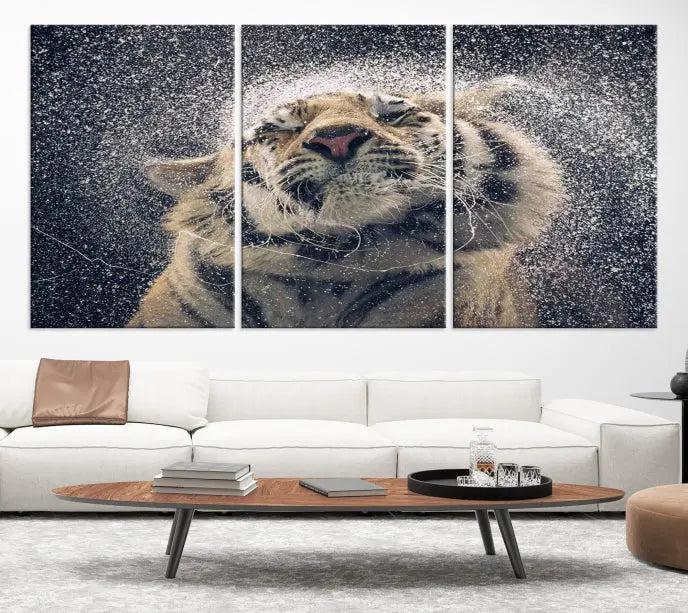 The "Tiger and Rain Canvas Print," featuring a triptych design of a tiger shaking off water, is printed on museum-quality canvas with gallery-wrapped edges.