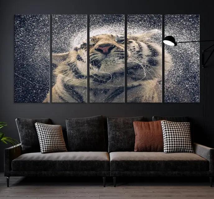 The "Tiger and Rain Canvas Print," featuring a triptych design of a tiger shaking off water, is printed on museum-quality canvas with gallery-wrapped edges.