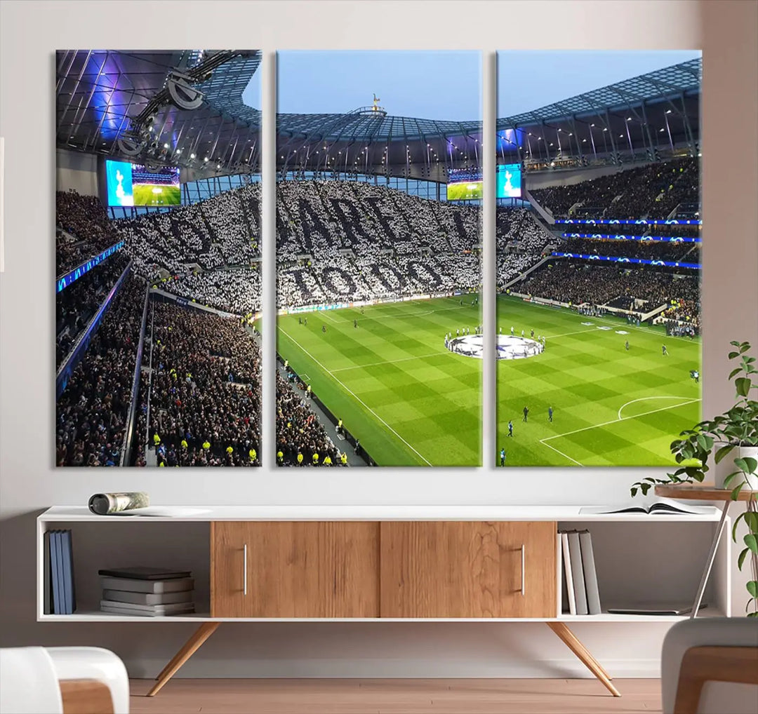 The Tottenham Hotspur Stadium Match Day Triple Canvas Wall Art - Premier League Football perfectly captures a vibrant stadium crowd spelling out "Dare" with cards, overlooking the soccer field. This piece embodies the essence of a true football enthusiast's space, reminiscent of thrilling moments at the Tottenham Hotspur Stadium.