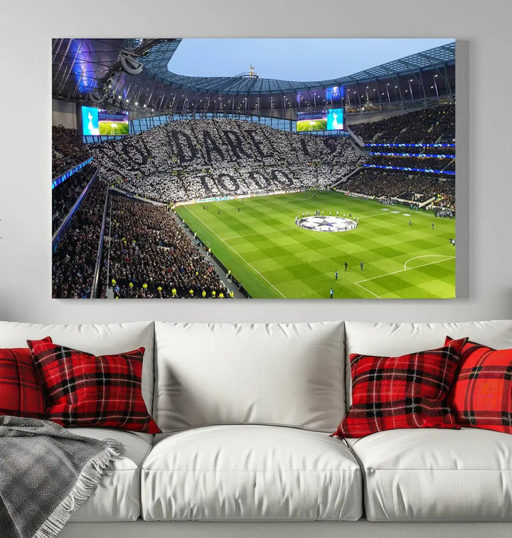 The Tottenham Hotspur Stadium Match Day Triple Canvas Wall Art - Premier League Football perfectly captures a vibrant stadium crowd spelling out "Dare" with cards, overlooking the soccer field. This piece embodies the essence of a true football enthusiast's space, reminiscent of thrilling moments at the Tottenham Hotspur Stadium.