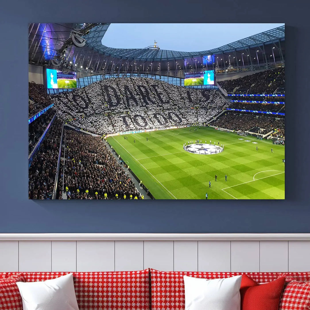 The Tottenham Hotspur Stadium Match Day Triple Canvas Wall Art - Premier League Football perfectly captures a vibrant stadium crowd spelling out "Dare" with cards, overlooking the soccer field. This piece embodies the essence of a true football enthusiast's space, reminiscent of thrilling moments at the Tottenham Hotspur Stadium.