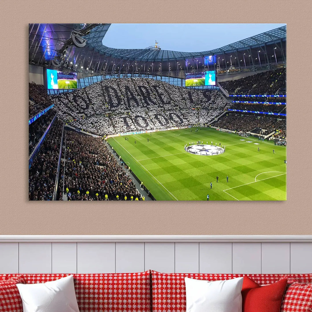 The Tottenham Hotspur Stadium Match Day Triple Canvas Wall Art - Premier League Football perfectly captures a vibrant stadium crowd spelling out "Dare" with cards, overlooking the soccer field. This piece embodies the essence of a true football enthusiast's space, reminiscent of thrilling moments at the Tottenham Hotspur Stadium.