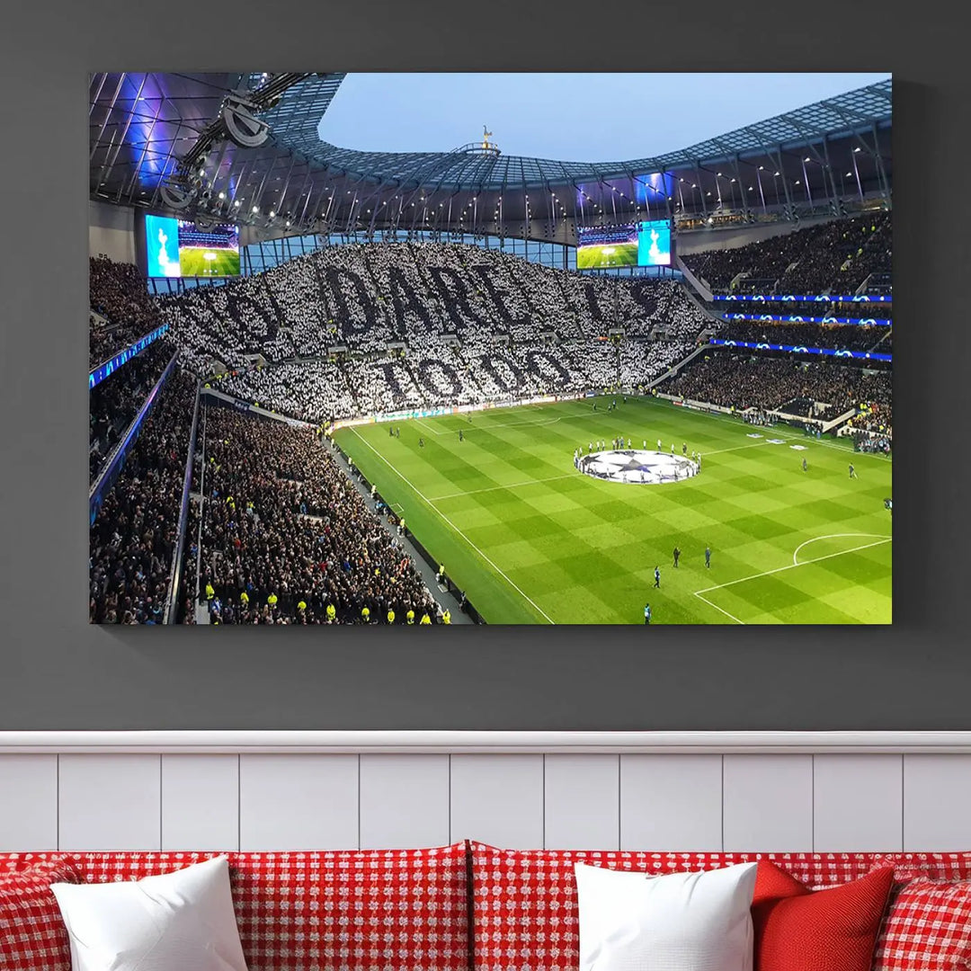 The Tottenham Hotspur Stadium Match Day Triple Canvas Wall Art - Premier League Football perfectly captures a vibrant stadium crowd spelling out "Dare" with cards, overlooking the soccer field. This piece embodies the essence of a true football enthusiast's space, reminiscent of thrilling moments at the Tottenham Hotspur Stadium.