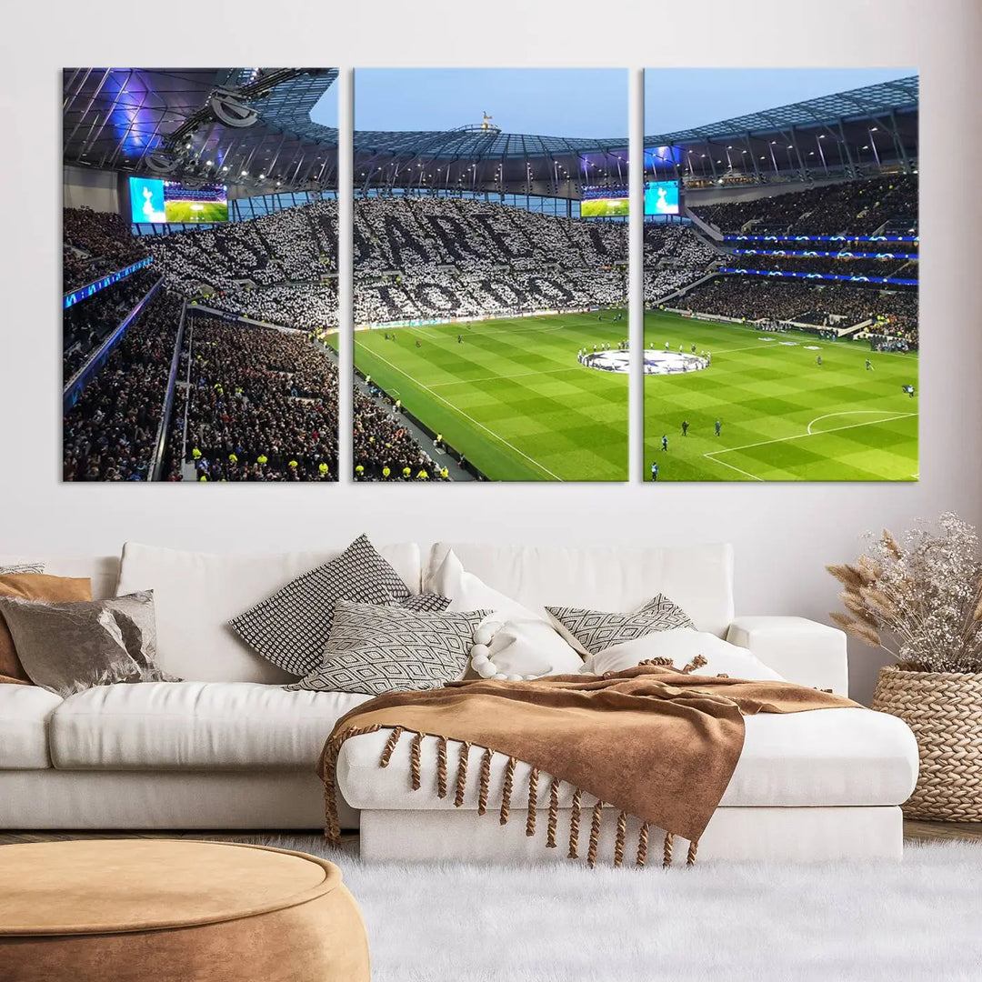 The Tottenham Hotspur Stadium Match Day Triple Canvas Wall Art - Premier League Football perfectly captures a vibrant stadium crowd spelling out "Dare" with cards, overlooking the soccer field. This piece embodies the essence of a true football enthusiast's space, reminiscent of thrilling moments at the Tottenham Hotspur Stadium.