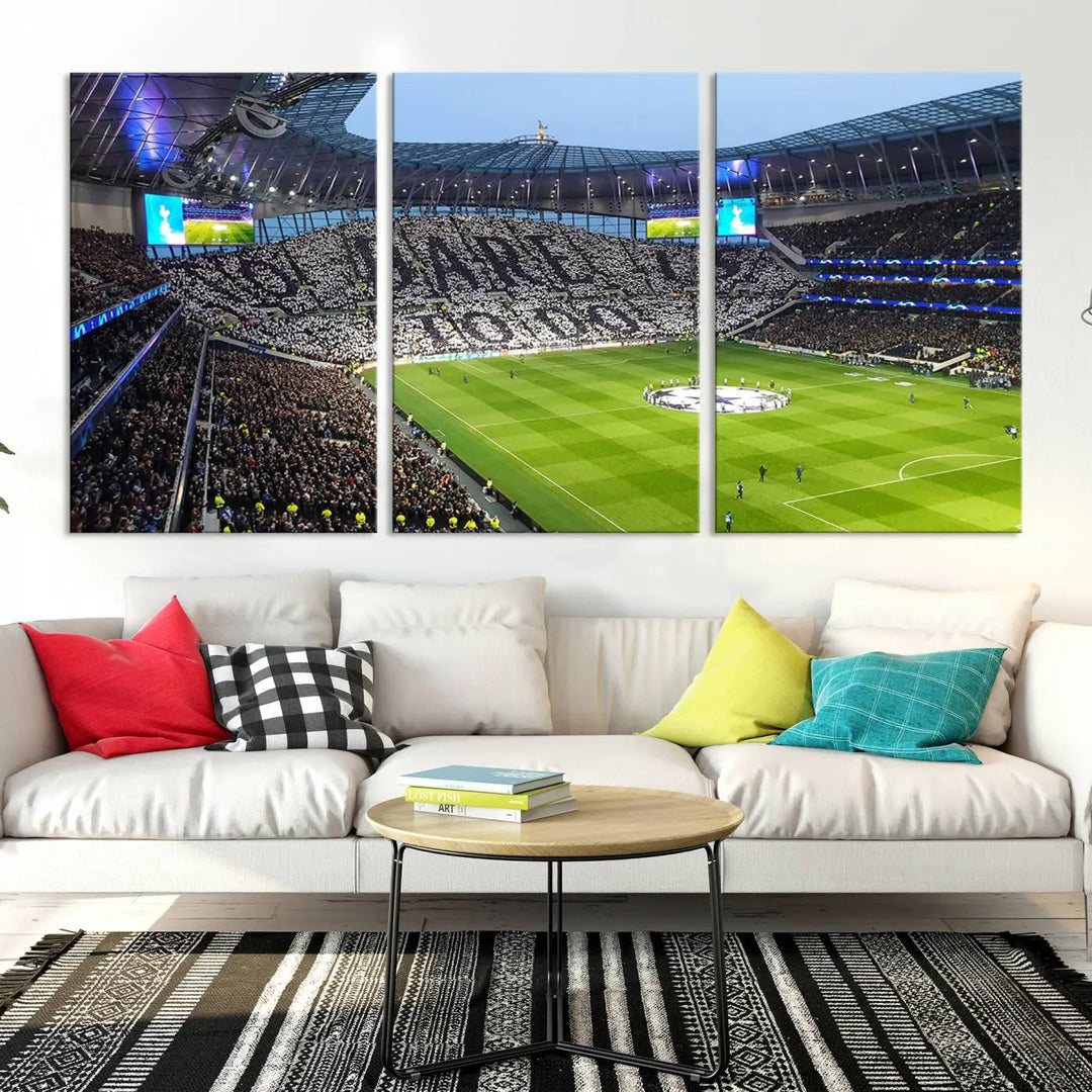 The Tottenham Hotspur Stadium Match Day Triple Canvas Wall Art - Premier League Football perfectly captures a vibrant stadium crowd spelling out "Dare" with cards, overlooking the soccer field. This piece embodies the essence of a true football enthusiast's space, reminiscent of thrilling moments at the Tottenham Hotspur Stadium.