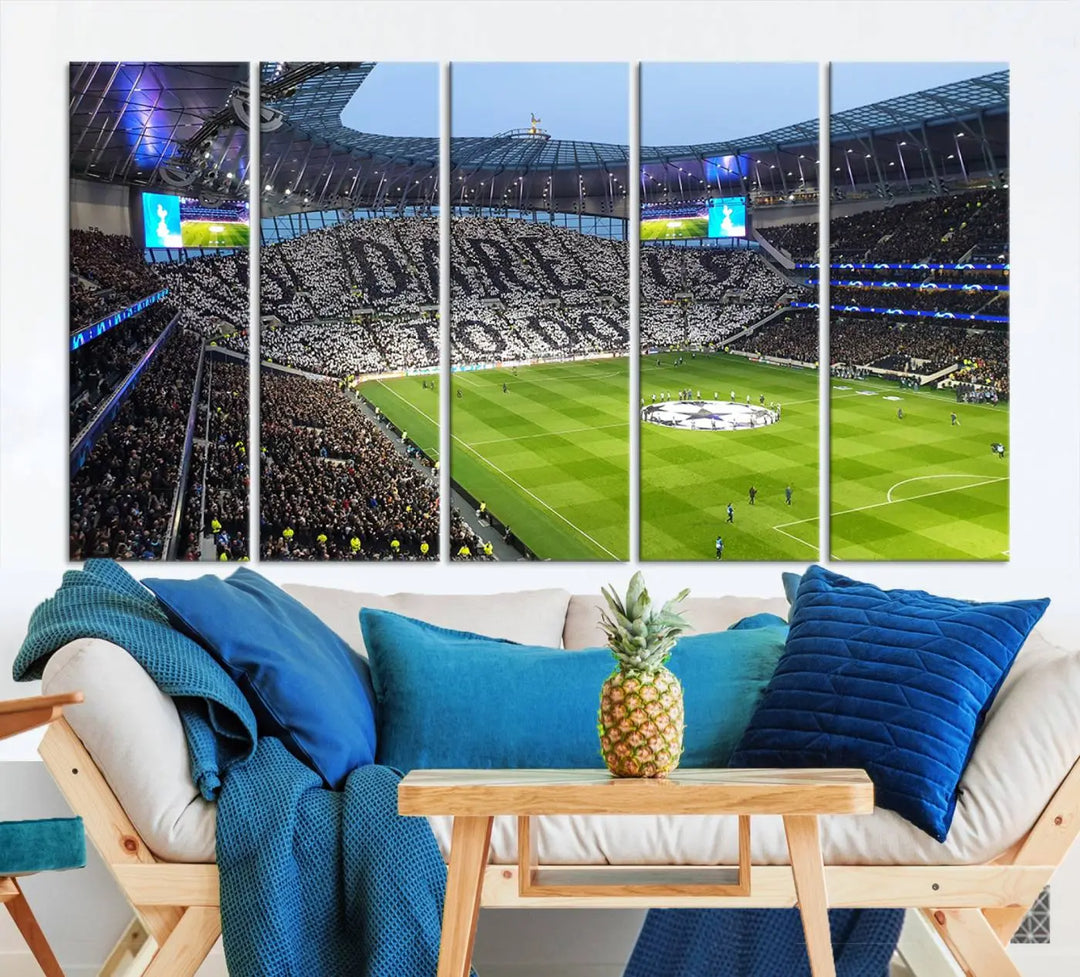 The Tottenham Hotspur Stadium Match Day Triple Canvas Wall Art - Premier League Football perfectly captures a vibrant stadium crowd spelling out "Dare" with cards, overlooking the soccer field. This piece embodies the essence of a true football enthusiast's space, reminiscent of thrilling moments at the Tottenham Hotspur Stadium.