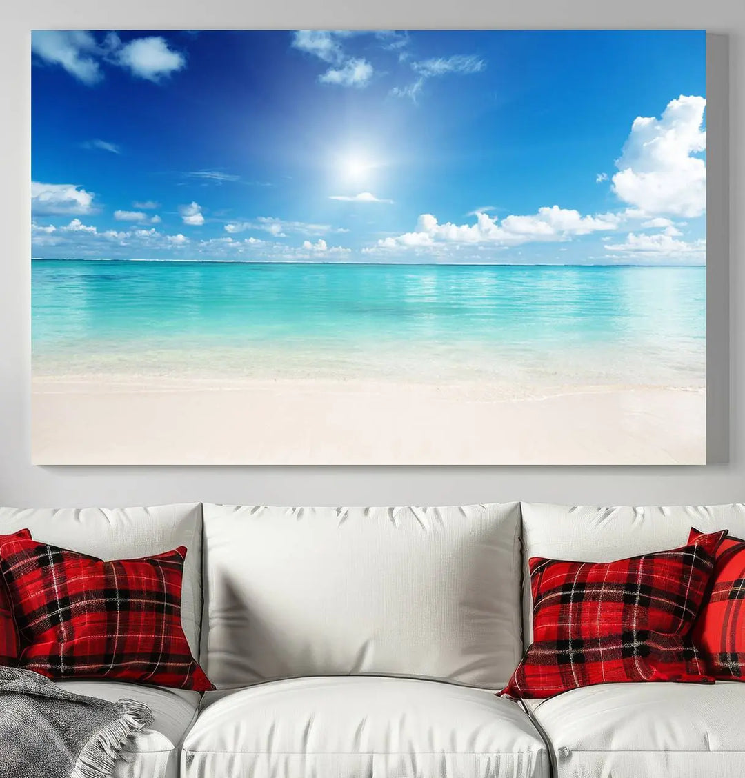 A serene living room is adorned with beach-themed artwork, featuring the Tranquil Ocean Paradise Triptych Wall Art that creates a soothing atmosphere. The neutral decor perfectly enhances the coastal retreat ambiance.