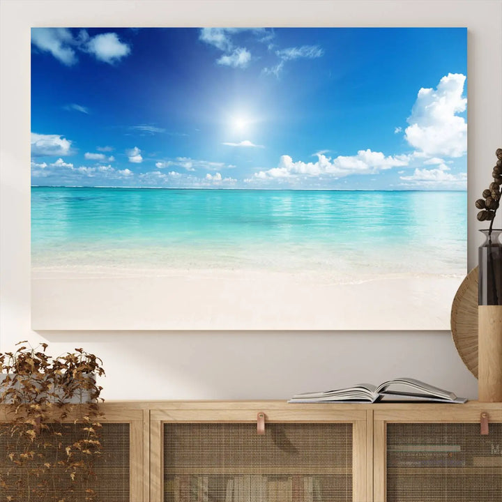 A serene living room is adorned with beach-themed artwork, featuring the Tranquil Ocean Paradise Triptych Wall Art that creates a soothing atmosphere. The neutral decor perfectly enhances the coastal retreat ambiance.