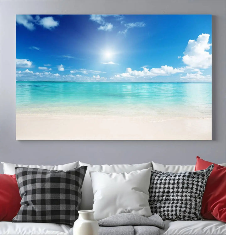 A serene living room is adorned with beach-themed artwork, featuring the Tranquil Ocean Paradise Triptych Wall Art that creates a soothing atmosphere. The neutral decor perfectly enhances the coastal retreat ambiance.