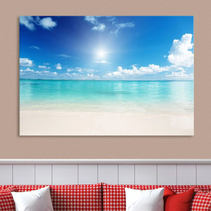 A serene living room is adorned with beach-themed artwork, featuring the Tranquil Ocean Paradise Triptych Wall Art that creates a soothing atmosphere. The neutral decor perfectly enhances the coastal retreat ambiance.