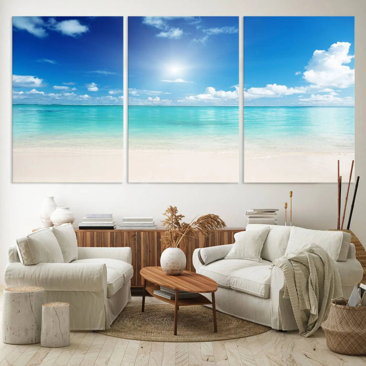 A serene living room is adorned with beach-themed artwork, featuring the Tranquil Ocean Paradise Triptych Wall Art that creates a soothing atmosphere. The neutral decor perfectly enhances the coastal retreat ambiance.