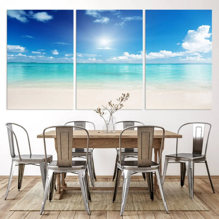 A serene living room is adorned with beach-themed artwork, featuring the Tranquil Ocean Paradise Triptych Wall Art that creates a soothing atmosphere. The neutral decor perfectly enhances the coastal retreat ambiance.