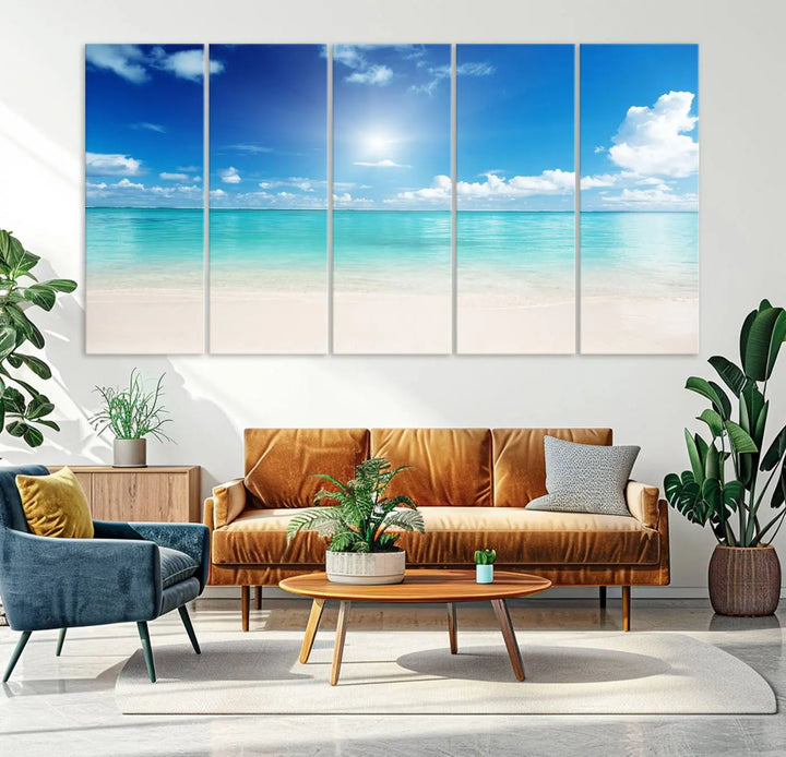 A serene living room is adorned with beach-themed artwork, featuring the Tranquil Ocean Paradise Triptych Wall Art that creates a soothing atmosphere. The neutral decor perfectly enhances the coastal retreat ambiance.