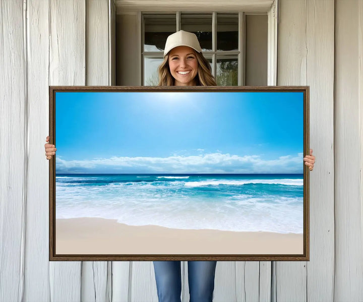 The Tranquil Ocean Waves Canvas Wall Art is displayed against a light wooden wall.